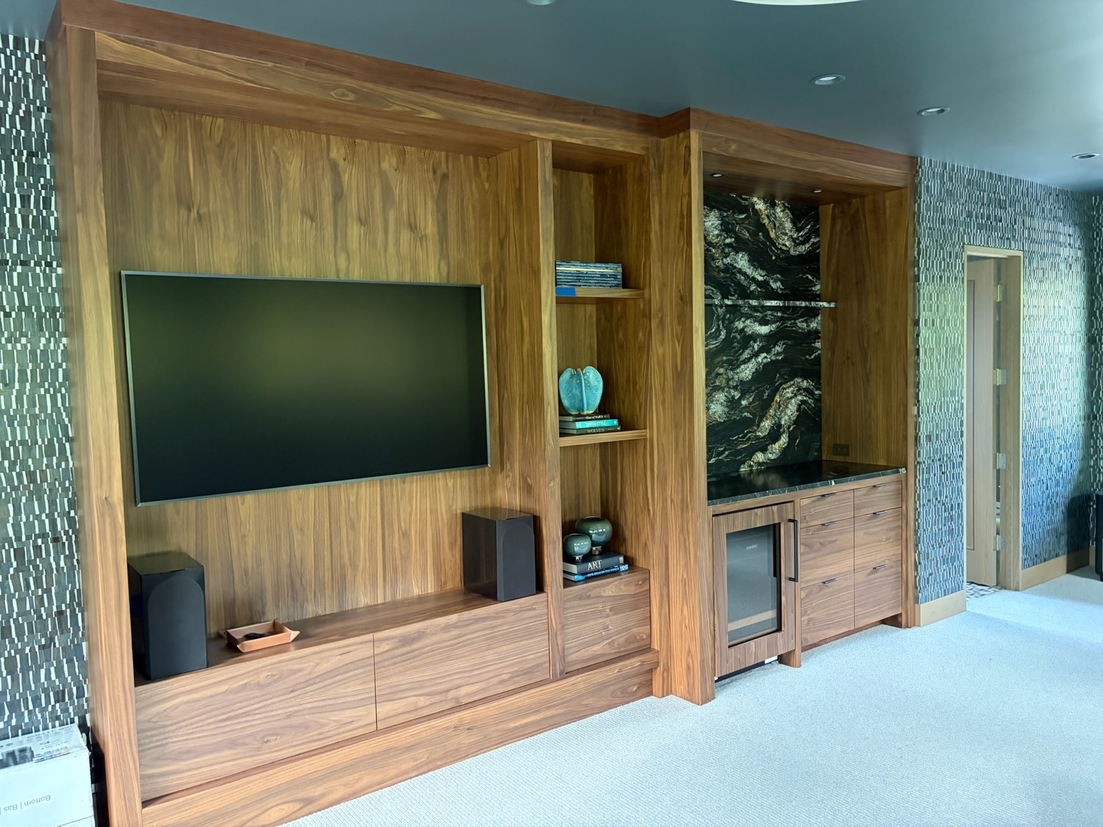 Media room with walnut built-ins, a deep painted ceiling and textured walls